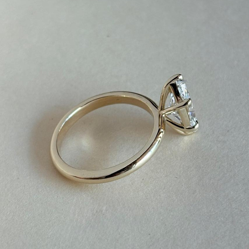 Six claw marquise cut solitaire