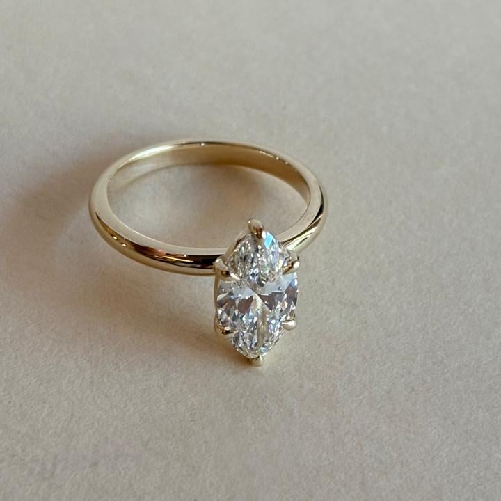 Six claw marquise cut solitaire