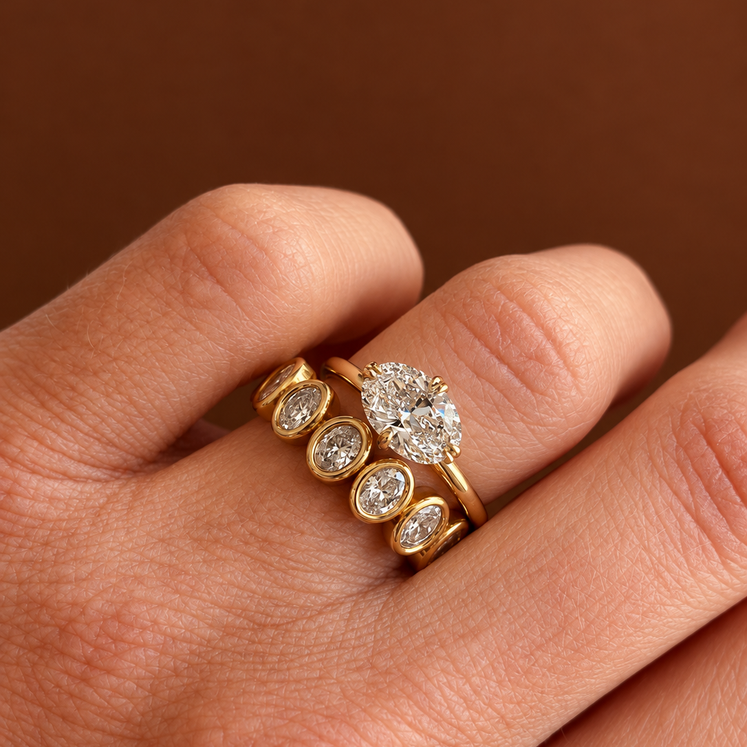 Oval East West Solitaire Ring