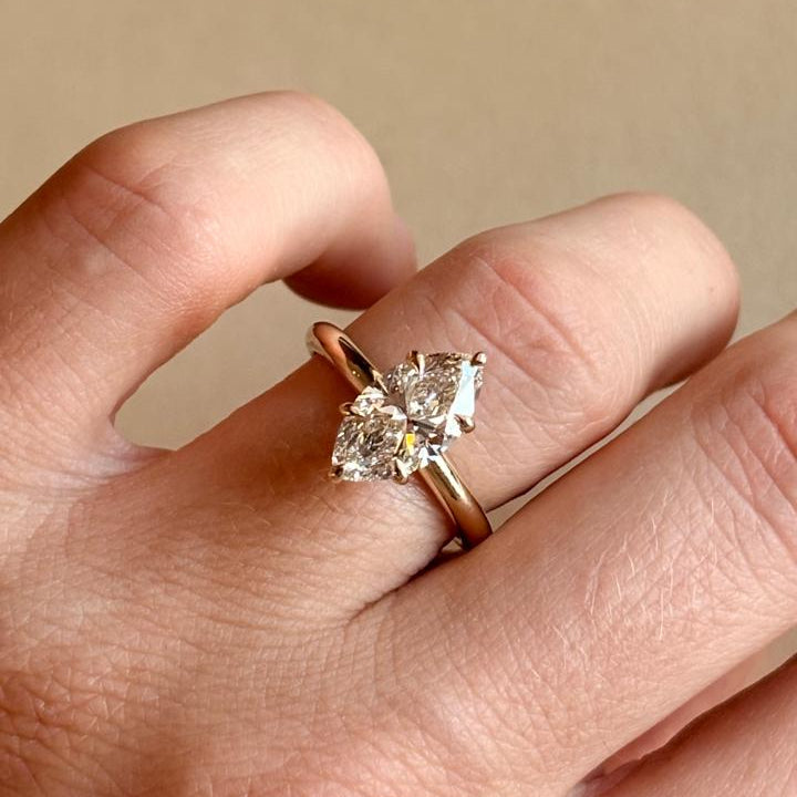 Six claw marquise cut solitaire