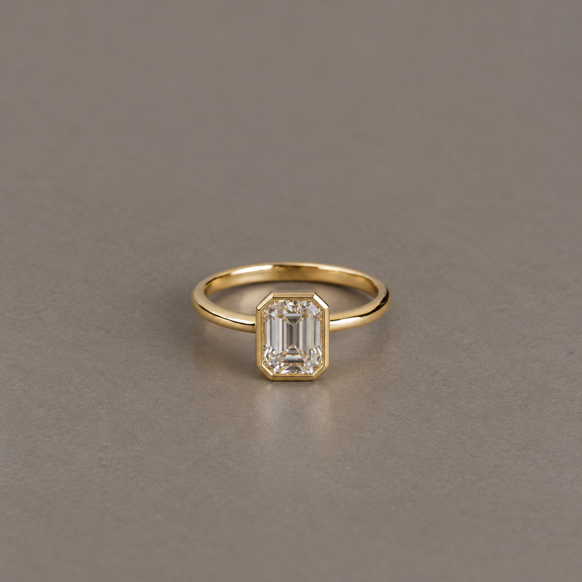 9ct Gold Bezel Set Emerald Cut Solitaire Ring