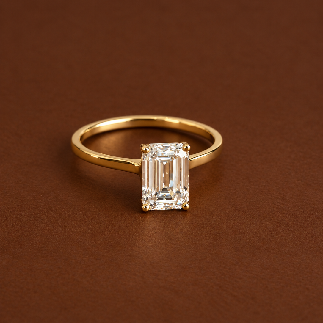 Emerald Claw Set Solitaire ring