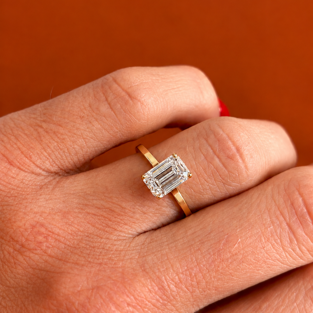 Emerald Claw Set Solitaire ring