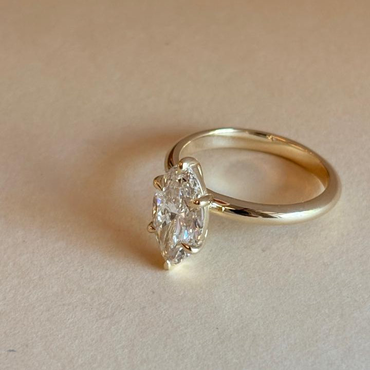 Six claw marquise cut solitaire