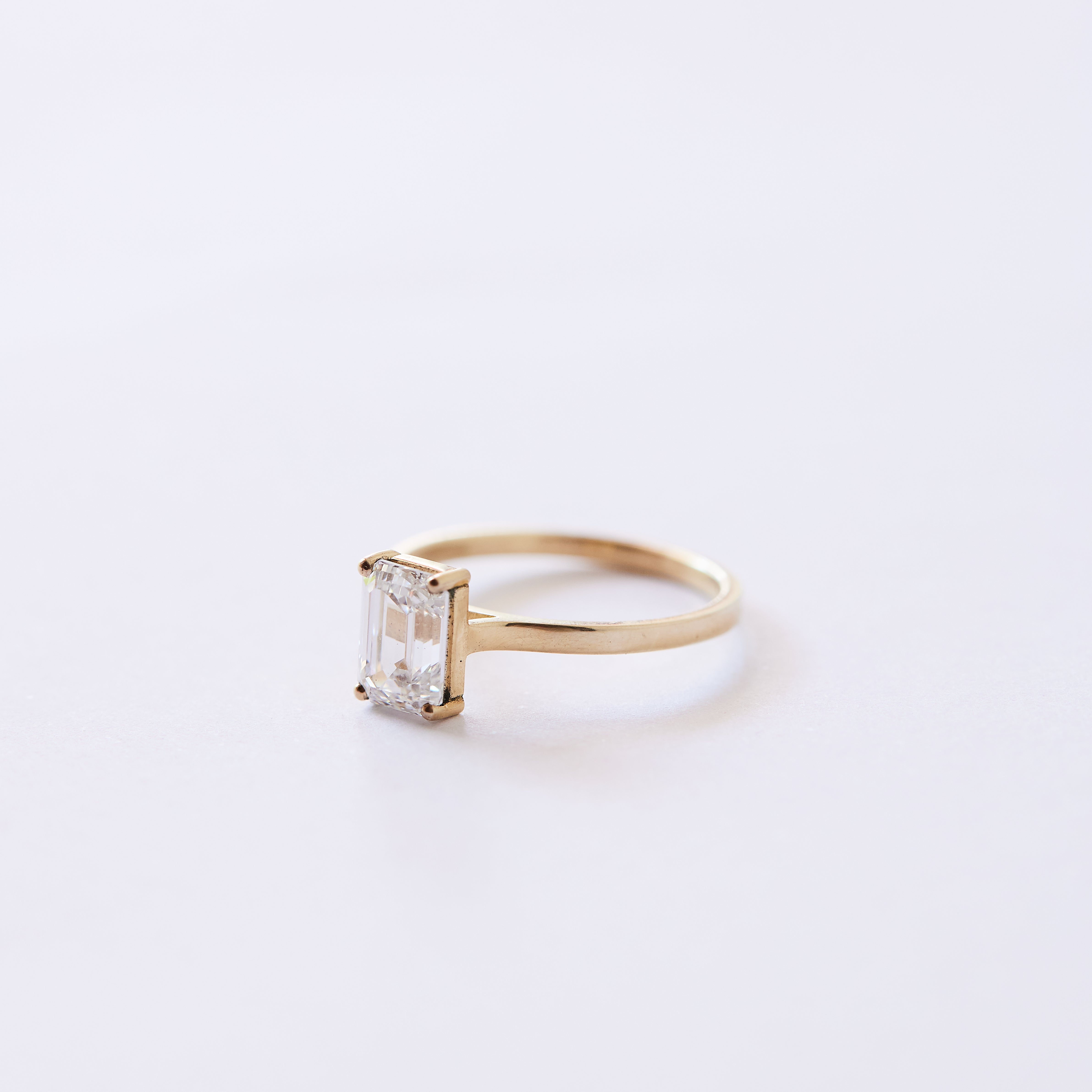 Emerald Claw Set Solitaire ring