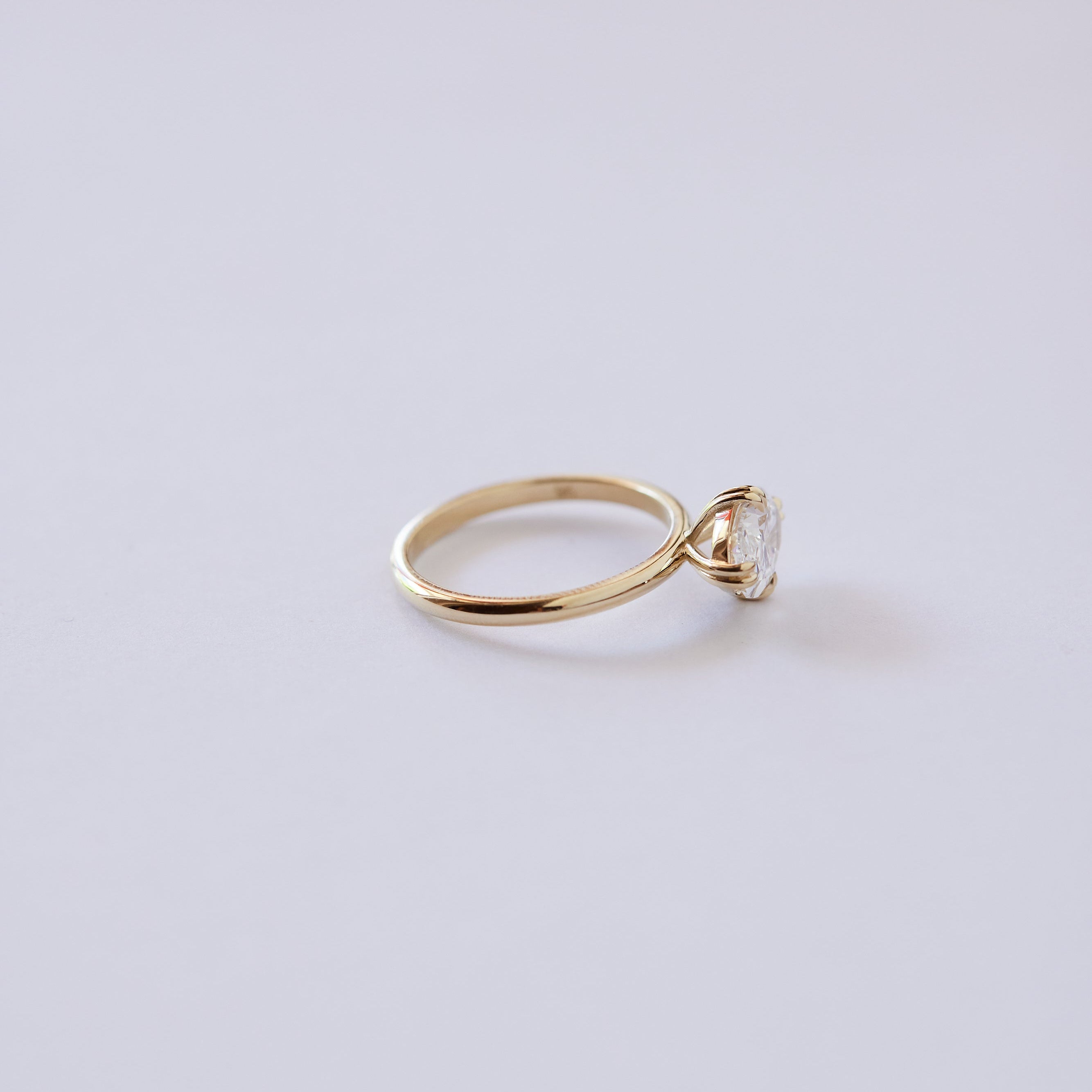 Oval East West Solitaire Ring
