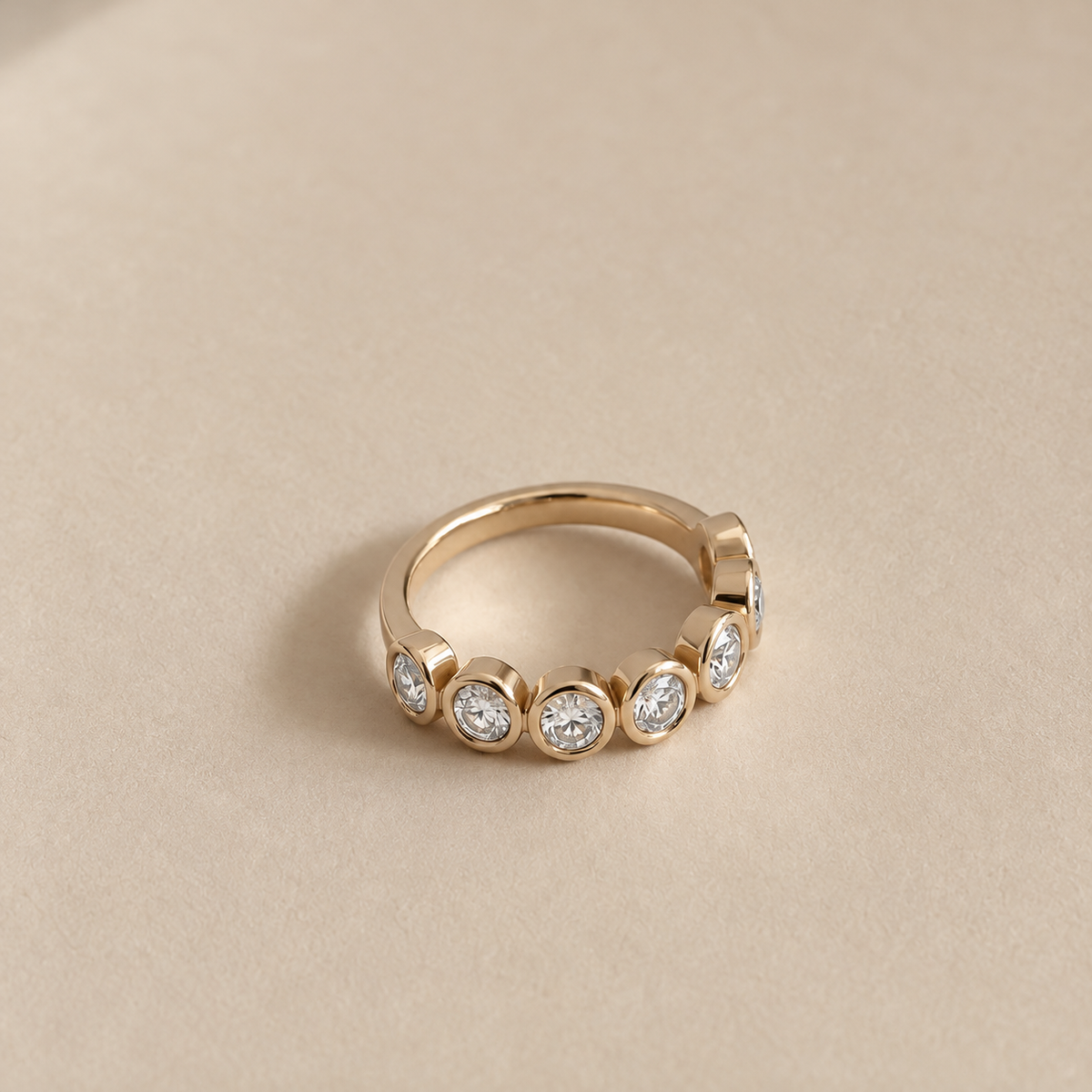Oval Bezel-Set Half Eternity Ring